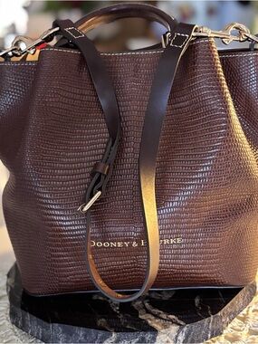Dooney & Bourke's Barlow Dark Chocolate Brown Tote comes with D&B duster bag